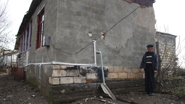 Locals in Gazyan blame some damage to buildings on shots from the Armenian side